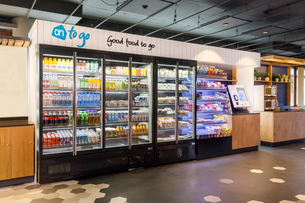 micromarket met magnetron Bespaar kosten en bied uw medewerkers een gezonde en flexibele voedselkeuze op de werkplek met Albert Heijn to go. Vraag nu uw kostenreductieplan aan!