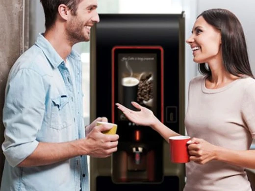 freestanding-coffee-machine freestanding office coffee machine with people enjoying a hot beverage